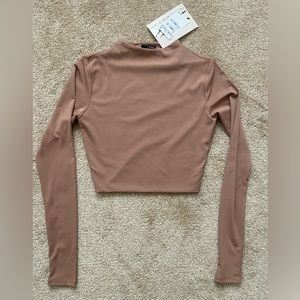 Naked wardrobe long sleeve crop top - size small